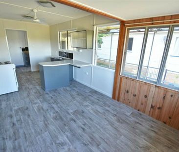 Spacious Family Home with Huge Yard, Side Access & Plenty of Storage! - Photo 6