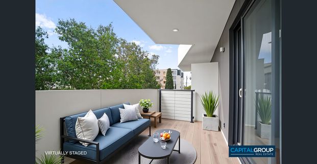 PRIME POSITION ONLY STEPS TO AMENITIES! - Photo 1