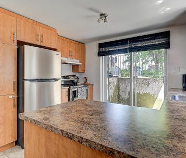 GRAND 4 1/2 À BLAINVILLE DANS UN SECTEUR TRANQUILLE - Photo 1