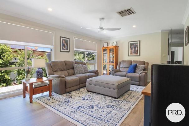 WELL PRESENTED FAMILY HOME! - Photo 1