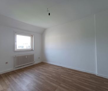 Dachgeschosswohnung in der Innenstadt! - Foto 3