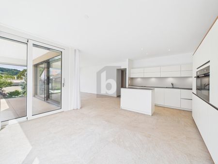 BRIGHT, MODERN WITH A FUTURE OUTLOOK! - Photo 2