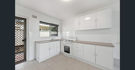 Comfortable & Convenient - Six Month Lease Only - Photo 2