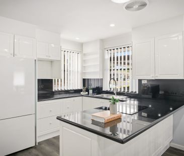 RENOVATED THREE BEDROOM HOME - Photo 5