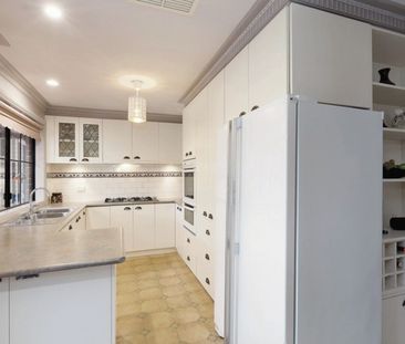 FOUR BEDROOM HOME IN QUIET STREET WITH LARGE BACKYARD - Photo 1