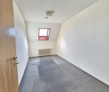 Helle 3- Zimmer- Dachgeschosswohnung mit PKW-Stellplatz in Delmenho... - Foto 1