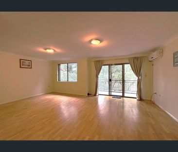 Two Bedroom Unit in Resort - Style Complex. - Photo 1