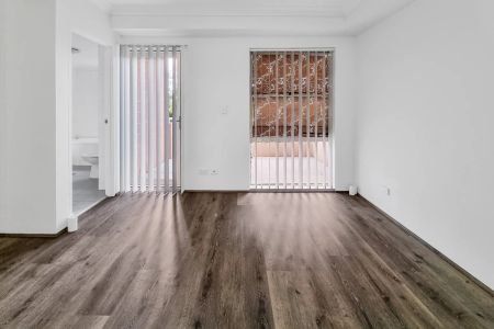 RENOVATED 3 BEDROOM DOUBLE STOREY APARTMENT WITH NEW FLOORING THROUGH-OUT - Photo 2