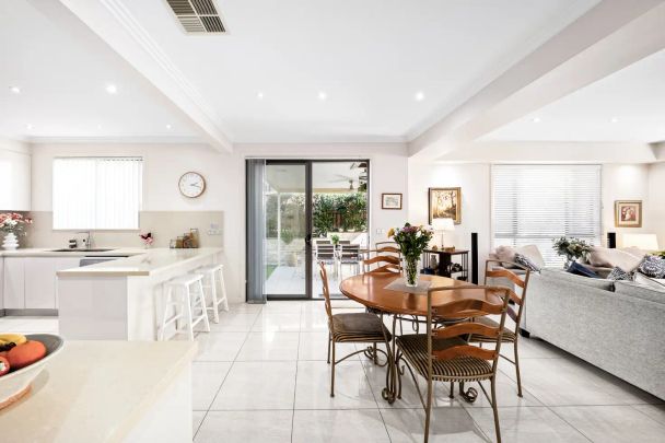 “Sunlit Townhouse with Style, Space & Comfort!” - Photo 1