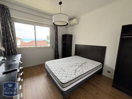 Location Appartement 3 pièces 64m² NICE 06200 - Photo 4