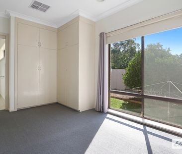 Spacious Two-Story Home with Versatile Layout! - Photo 4