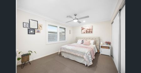 Stunning 4 bedroom home with ducted air conditioning and sparkling spa! - Photo 2