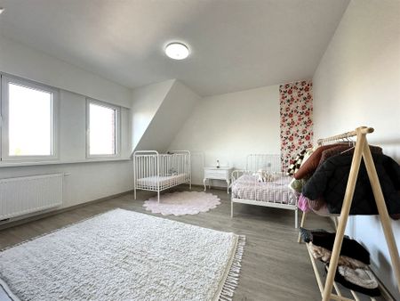 Gerenoveerde woning te Buggenhout (Opstal) - Photo 2