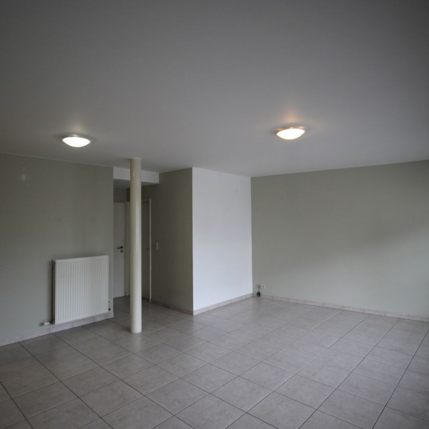 Een gezellig appartement op benedenverdieping vooraan - met garage - Photo 1