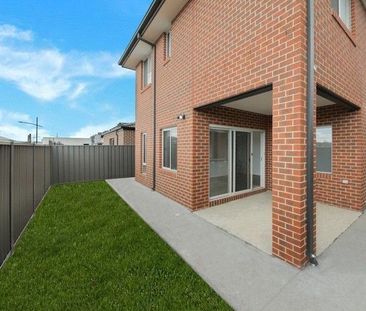 Modern Comforts Await in This 4-Bedroom, 2-Bathroom Home - Photo 1