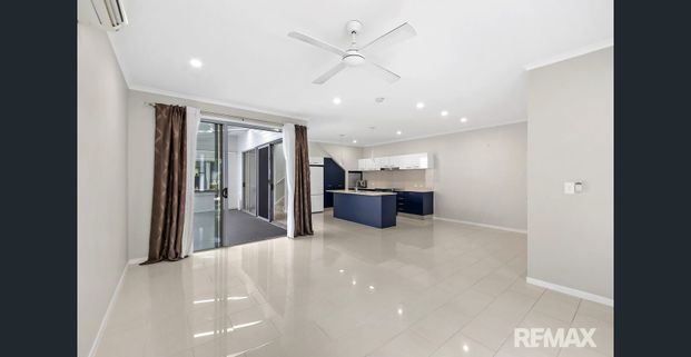 Spacious 3 bedroom home with multiple living areas in premium lifestyle location. - Photo 1