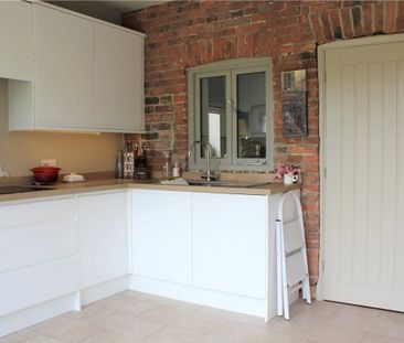 Available early December, 1 The Cottages is a welcoming two bedroom... - Photo 5