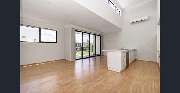 Light-Filled Three-Bedroom Loft Home in a Prized Location - Photo 1