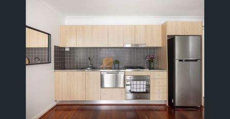 Two-bedroom city apartment in private rear position, pets considered on app - Photo 3