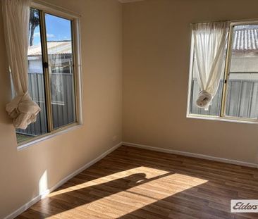 Long-Term 2-Bedroom Rental with Secure Fenced Yard - Photo 6