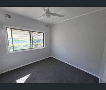 Neat & Tidy Unit in Prime Location - Photo 1