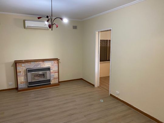 Comfortable Family Home with Generous Yard! - Photo 1