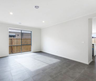 Modern 4-Bedroom Home with Open Plan Living and Large Backyard - Photo 1