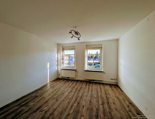 Gemütliche Erdgeschosswohnung mit Einbauküche - Foto 1