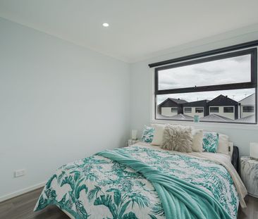 Spacious and Versatile Three-Bedroom Townhome in Prime Family Locat... - Photo 1