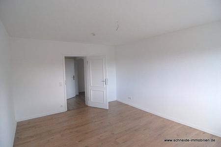 Geräumige 2-Zimmer-1.OG-Wohnung mit Wohnküche und Balkon - Foto 4