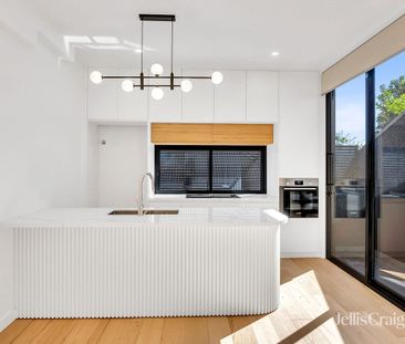 Brand New Two Bedroom Townhouse with Roof Top and City Views - Photo 1