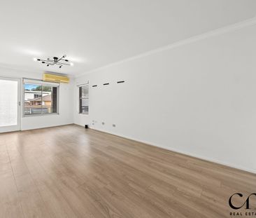 Spacious Two Bedroom Apartment - Now Available - Photo 1