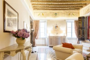 Center-Historic Jewish Quarter: Elegant apartment situated in beautiful Palazzo Nobiliare. Entrance, spacious living with original wood frescoed ceilings, large modern dining and kitchen, 4 bedrooms, 4 Baths, small terrace. #1527