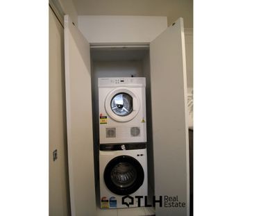FULLY FURNISHED 1-BEDROOM ENVELOPED IN NATURAL LIGHT - Photo 4