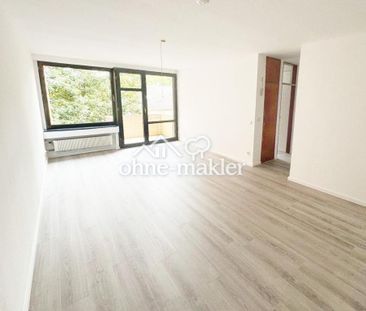 Renovierte Wohnung mit Dachterrasse, Garten und Tiefgarage direkt a... - Foto 1