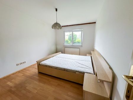 Charmante 2-Zimmer-Erdgeschosswohnung mit Garten und Carport - Foto 2