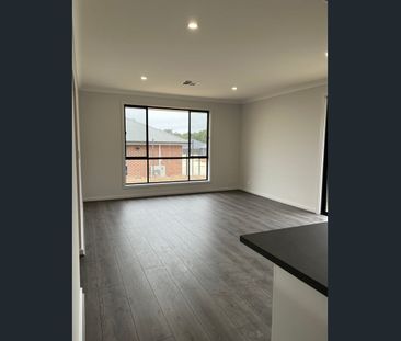 Modern 4 Bedroom 2 Bathroom Home in Blue Stone - Photo 1