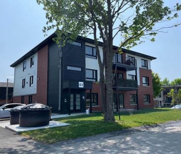 Beaux 4 1/2 NEUFS, quartier tranquille, dès maintenant; Rue Armand - Photo 1