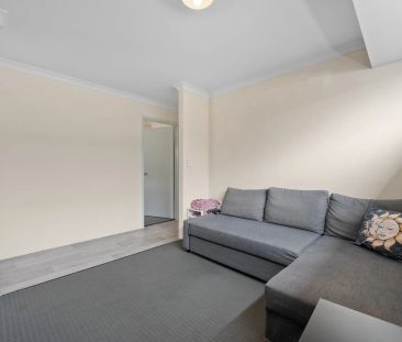 Modern, low-maintenance living opposite the park. - Photo 2