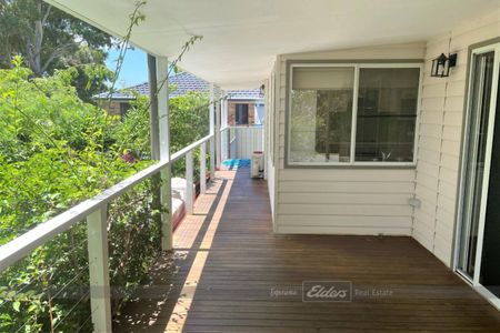 THREE BEDROOM HOME IN TRANQUIL GREEN POINT - Photo 5