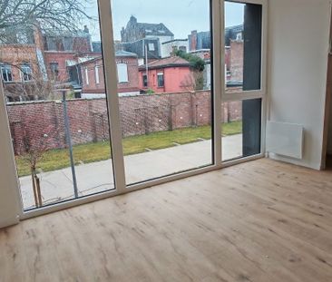 Location Appartement 4 pièces 91m² ROUBAIX 59100 - Photo 2