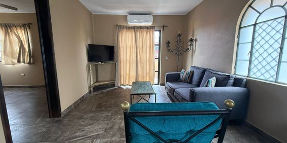 Furnished Apartment with Private Rooftop - Photo 3