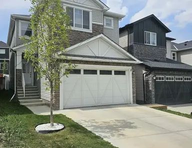 NICE 4BEDROOM + DEN WITH BIG BACKYARD PATIO AND A/C | Nolanhurst Crescent Northwest, Calgary - Photo 1