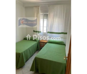 Casa adosada en alquiler en Nuevo Portil - Photo 1