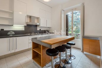 Spacious renovated apartment with balconies in a historic building