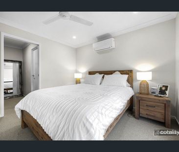 4-Bedroom Family Home with Modern Amenities in Palmview - Photo 6