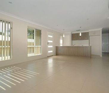 Ideally Located Modern Three Bedroom Unit with Ensuite - Photo 2