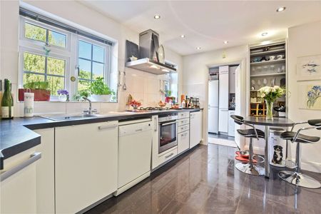 This attractive 4 bedroom family home is set within the private Moor Park Estate, providing access to Moor Park Station. Available beginning of December. - Photo 5