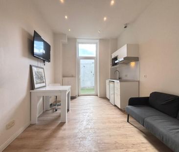 Parc du Cinquantenaire - Rez-de-chaussée 1ch meublé +/- 45m² avec g... - Photo 3