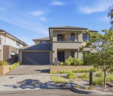 Expansive Family Living with Two Main Bedrooms - Photo 6